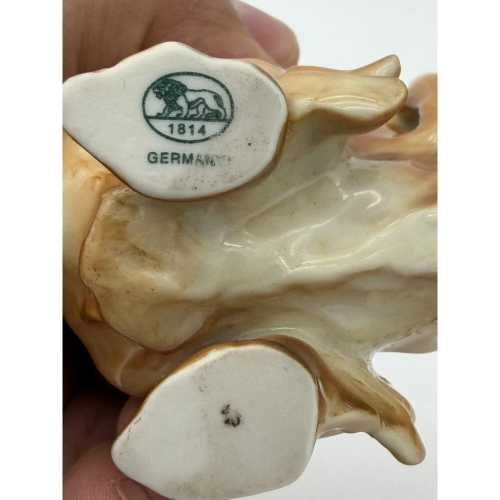 Hutschenreuther Porcelain Germany pekinese Dog Glossy Painted Figurine Brown